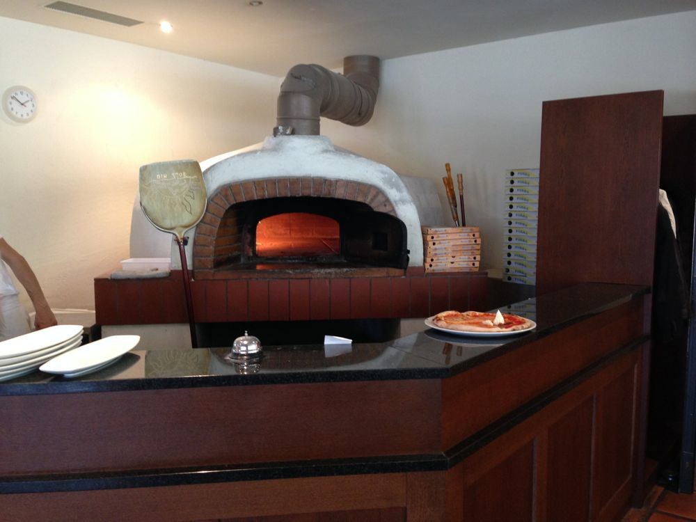 Wo gross und klein der Pizza beim Backen zuschauen kann – der Holzofen.